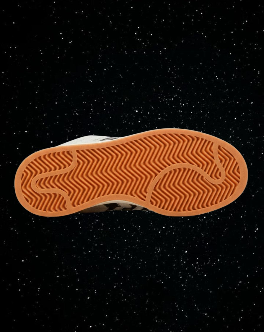 Bottom view of LegitGCC Adidas Campus Platinum sneaker featuring a classic gum rubber herringbone traction outsole