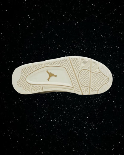 LegitGCC Jordan 4 Gold Metallic sneaker showing the cream-colored rubber outsole with a gold Jumpman logo